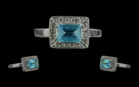 Ladies Aquamarine and Diamond Ring - Set In White 9ct Gold. An Attractive Ring Set with
