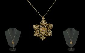 Antique Period Attractive 9ct Gold Seed Pearl Set Pendant Brooch attached to long 9ct gold chain,