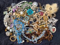 A Collection of Assorted Costume Jewellery to include various beads and brooches etc