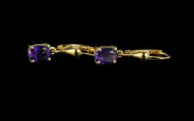 Amethyst Drop Earrings, single, oval cut, rich purple amethysts suspended from 18ct gold vermeil and