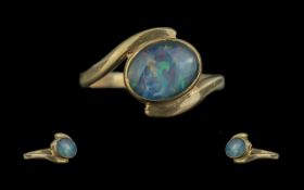 Black Opal Ring Set In 9ct Gold. Black Fire Opal Set In Yellow 9ct Gold. The Ring of Twist Design.