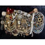 Collection of Vintage Costume Jewellery, comprising brooches, pearls, bangles, beads, brooches,