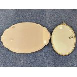 Two Vintage Wall Mirrors, one oval with bow top measures 20'' x 13'', and a larger oval mirror