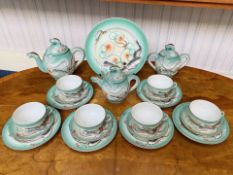 Oriental Pattern Tea Service, comprising a large teapot, small teapot, lidded sugar bowl, six