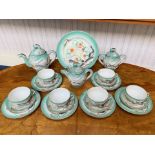 Oriental Pattern Tea Service, comprising a large teapot, small teapot, lidded sugar bowl, six