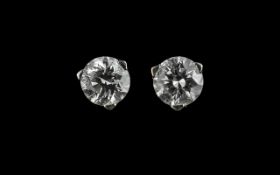 18ct White Gold - Superb Pair of Diamond Stud Earrings. Marked 750 - 18ct. The Round Brilliant Cut