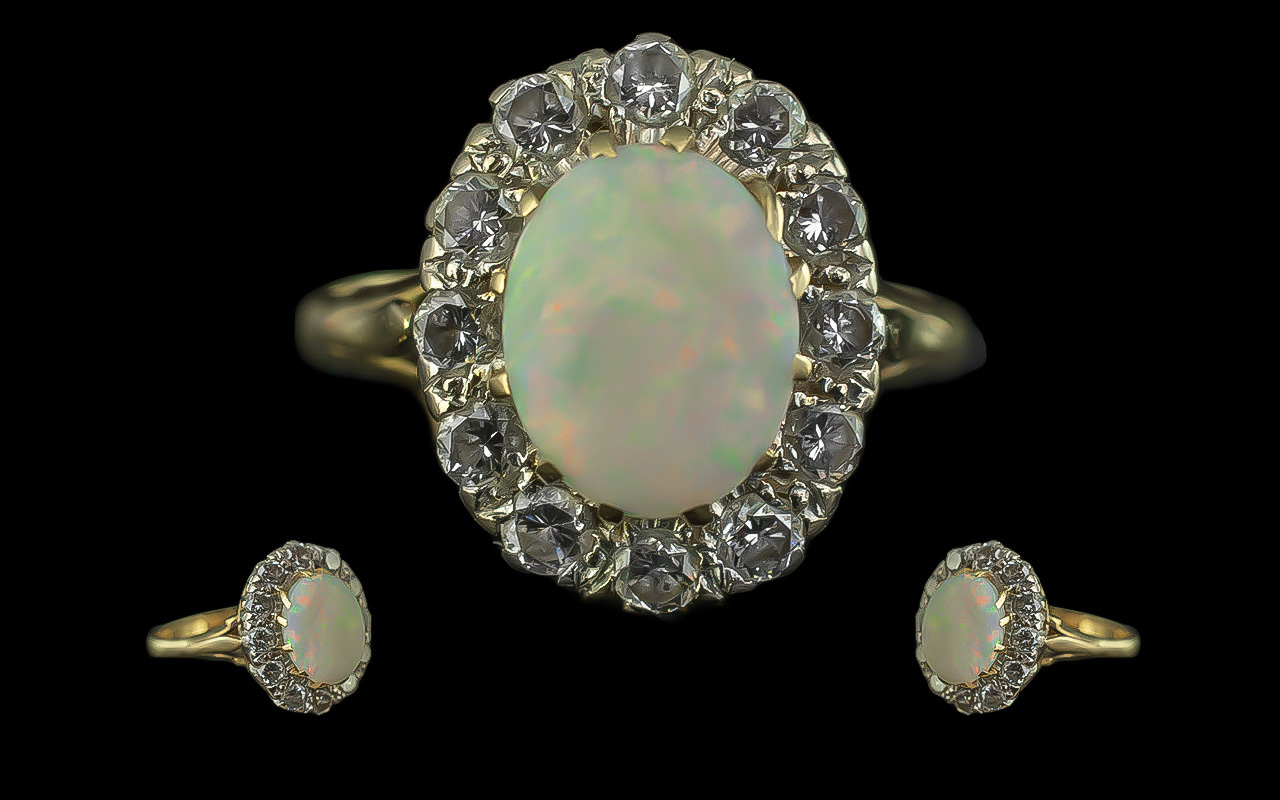 18ct Gold - Attractive Opal and Diamond Set Ring, Flower head Setting. Full Hallmark for 18ct. The