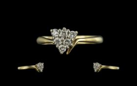 18ct Gold - Attractive Contemporary Diamond Set Dress Ring. Marked 750 - 18ct to Shank. The Diamonds