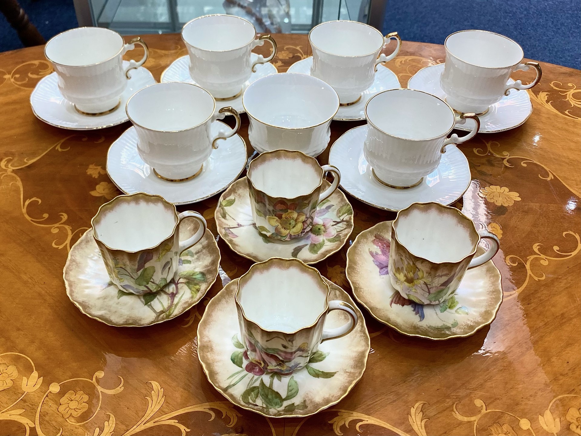 Doulton Burslem Vintage Set comprising four small cups and saucers, decorated with a delicate floral
