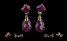 9ct Gold Drop Earrings set with faceted amethysts, each of approx. 2cts, a total of 4cts; hallmarked