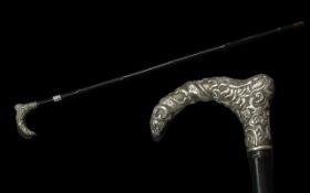 Antique Silver Topped Walking Stick with dragon and serpent decoration; 36 inches (90cms) long