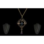 Victorian Period - Attractive 15ct Gold Blue Sapphire and Pearl Set Open worked Pendant. The Blue