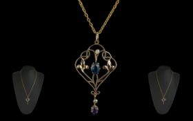 Victorian Period - Attractive 15ct Gold Blue Sapphire and Pearl Set Open worked Pendant. The Blue