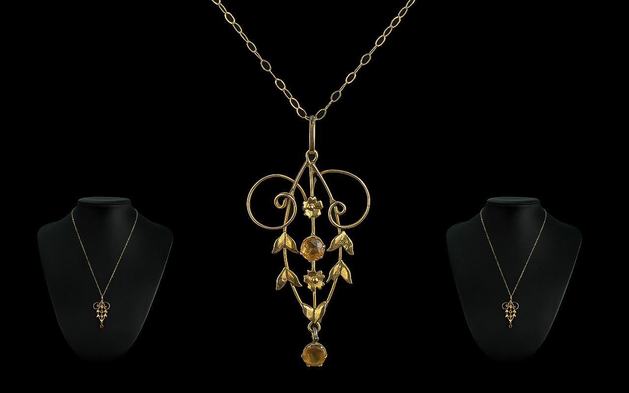 Edwardian Citrine Set Pendant suspended on a 9ct gold chain, a superbly designed antique gold