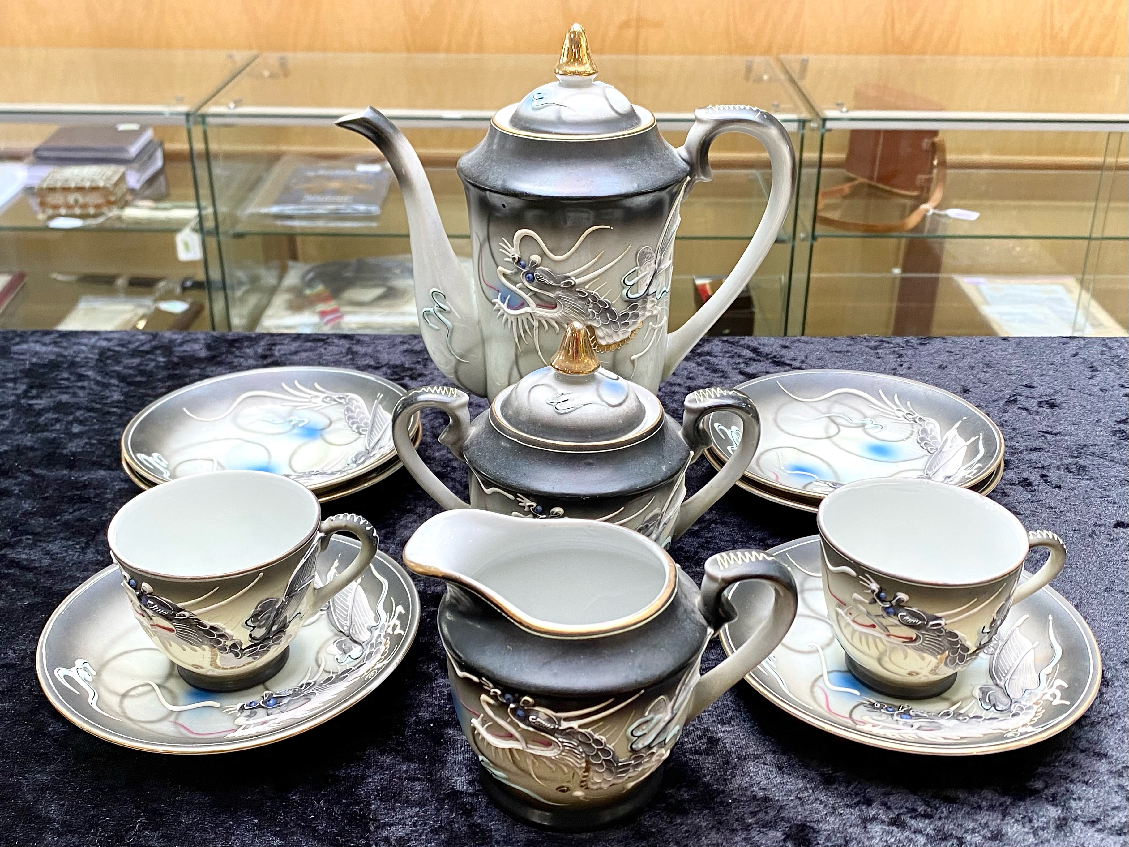 Small Chinese Tea Set, comprising a teapot, milk jug, lidded sugar bowl, two cups and six saucers.