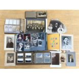 Box of Ephemera, including stamps, large scrapbook. album of photographs from wartime, topographical