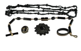 Collection of Antique Jewellery including black costume jewellery, brooches, necklace, fob chain