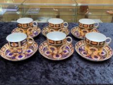 Royal Crown Derby Set, comprising six Royal Crown Derby Imari pattern coffee cans and saucers.