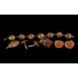 Small Collection of Baltic Amber Items comprising an oval pendant, a domed bead station bracelet,
