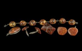 Small Collection of Baltic Amber Items comprising an oval pendant, a domed bead station bracelet,