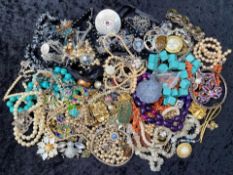 A Collection of Assorted Costume Jewellery to include various beads and brooches etc