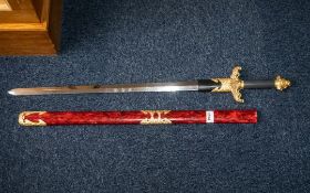 Decorative Oriental Fantasy Display Sword in red case, with gold handle. Measures 35'' length.