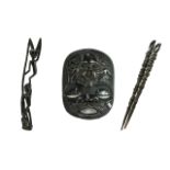 Tribal Art Interest. A Collection of Four Carved Wooden Items. To include a large face mask 22 by 18