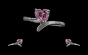 An Attractive Heart Shaped Vibrant Pink Stone Set In Silver Ring. Heart Shaped Stone, Approx 1 ct,