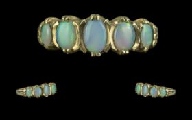 Ladies - Attractive 9ct Gold 5 Stone Opal Set Ring. Fully Hallmarked to Shank. The Five Oval