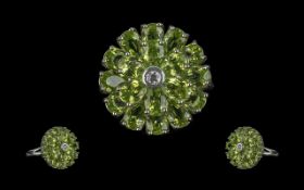 Peridot Target Cluster Ring, two circles of pear cut peridots, one slightly above the other,