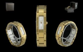 Gucci Ladies Gold Plated Fashion Watch, with integral bracelet. Comes with Gucci box, booklet and