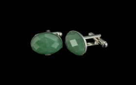 Pair of Gentleman's Cuff Links, set with faceted Jade stones, unmarked white meta.
