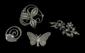 Collection of Silver Brooches including antique silver marcasite flower brooch, silver butterfly,