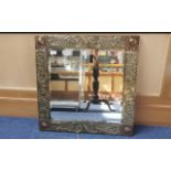 Early 20th Century Brass Arts &^ Crafts Framed Wall Mirror, with copper corner bosses. Square shape,