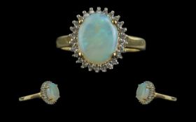Ladies 9ct Gold Attractive Opal and Diamond Set Cluster Ring. Marked 9ct to Interior of Shank. The