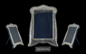 A Sterling Silver Shaped Photo Frame. Hallmark London 2017, Maker H.F. Height 8.5 Inches - 21.25