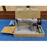 Singer Vintage Electric Sewing Machine, in coffee/brown colourway, in fitted case with