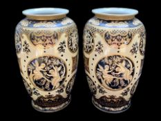 Pair of Oriental Vases, decorated with floral designs and cherubs, in mainly black and gold colour