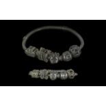 A Pandora Silver Bracelet with three charms.
