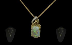 A Superb 18ct Gold Diamond and Opal Set Pendant, The Large Oval Shaped Opal of Excellent Multi-