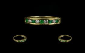 18ct Gold Emerald and Diamond Half Eternity Ring set with alternating round cut emeralds and