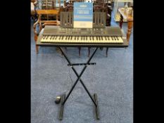 Yamaha Keyboard Portatone PSR 300, with adjustable stand and owners guide. Good condition.