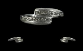 Contemporary Ladies Diamond Ring Set In 9ct White Gold. Contemporary Design, Set with Channel Set