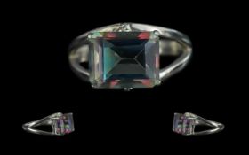 Mystic Topaz Solitaire Ring, set in 9ct white gold, a stylish design holding the mystic topaz of