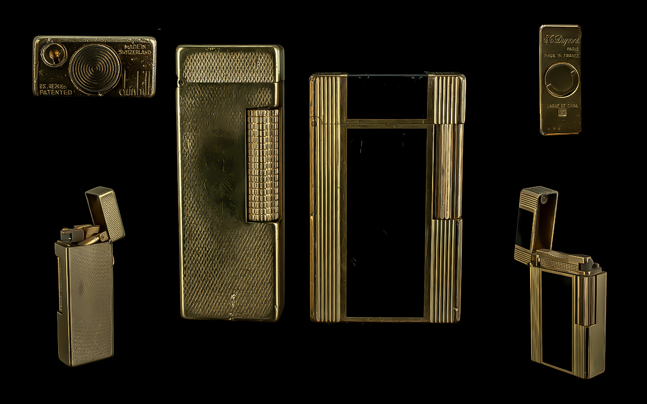 S.T.Dupont Paris Excellent Gold Plated Cigarette Lighter, Set with Black Enamel Panels. c.1970's.