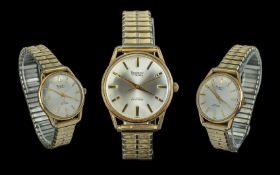 Regency Gents Gold on Steel Mechanical Wind Automatic 17 Jewels, circa 1950's. Features a pearl dial