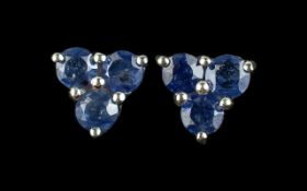 Sapphire Trilogy Cluster Earrings, each earring having three, beautiful blue, round cut sapphires,