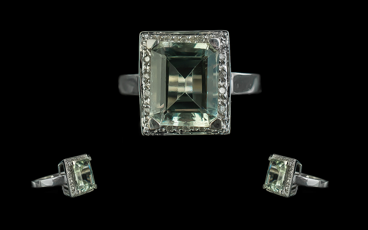 Ladies 9ct White Gold Pale Aquamarine & Diamond Set Dress Ring, marked 9ct to shank. The step cut