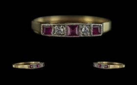 18ct Gold and Platinum - Petite 5 Stone Ruby and Diamond Set Ring. Marked 18ct and Platinum. The