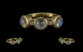 Moonstone Trilogy Ring, three moonstone cabochons,, each with a very strong presence of the